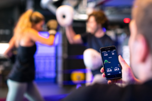 person holding black smartphone taking photo of man in black shirt — Foto por ThisisEngineering na Unsplash